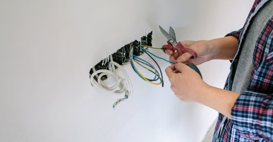 man working on wiring project